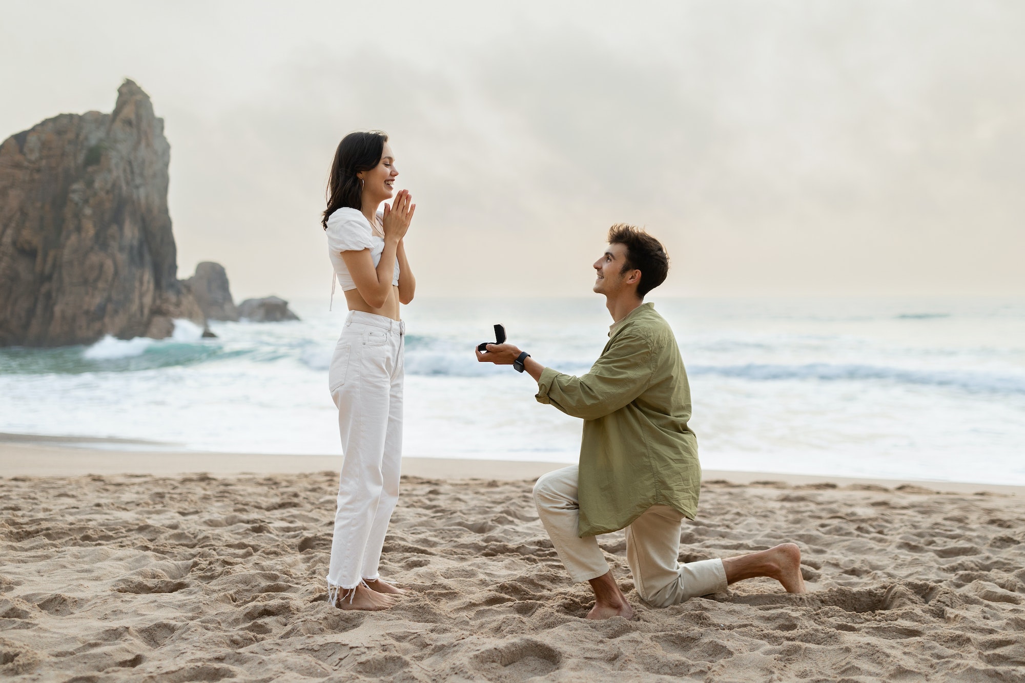 romantic-proposal-on-the-seashore-loving-young-man-with-engagement-ring-making-proposal-to-happy.jpg